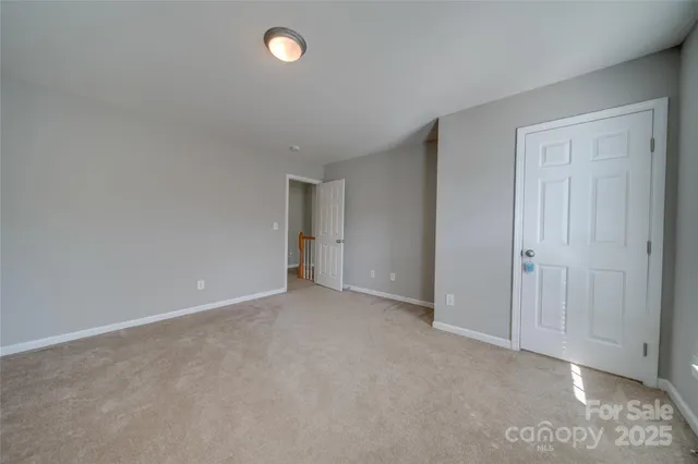 an empty room with an entryway