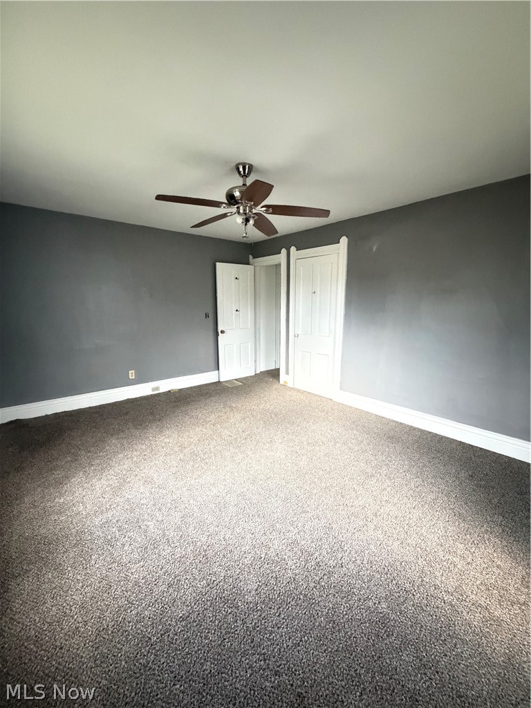 Recessed lighting, ceiling fan, and carpeted flooring