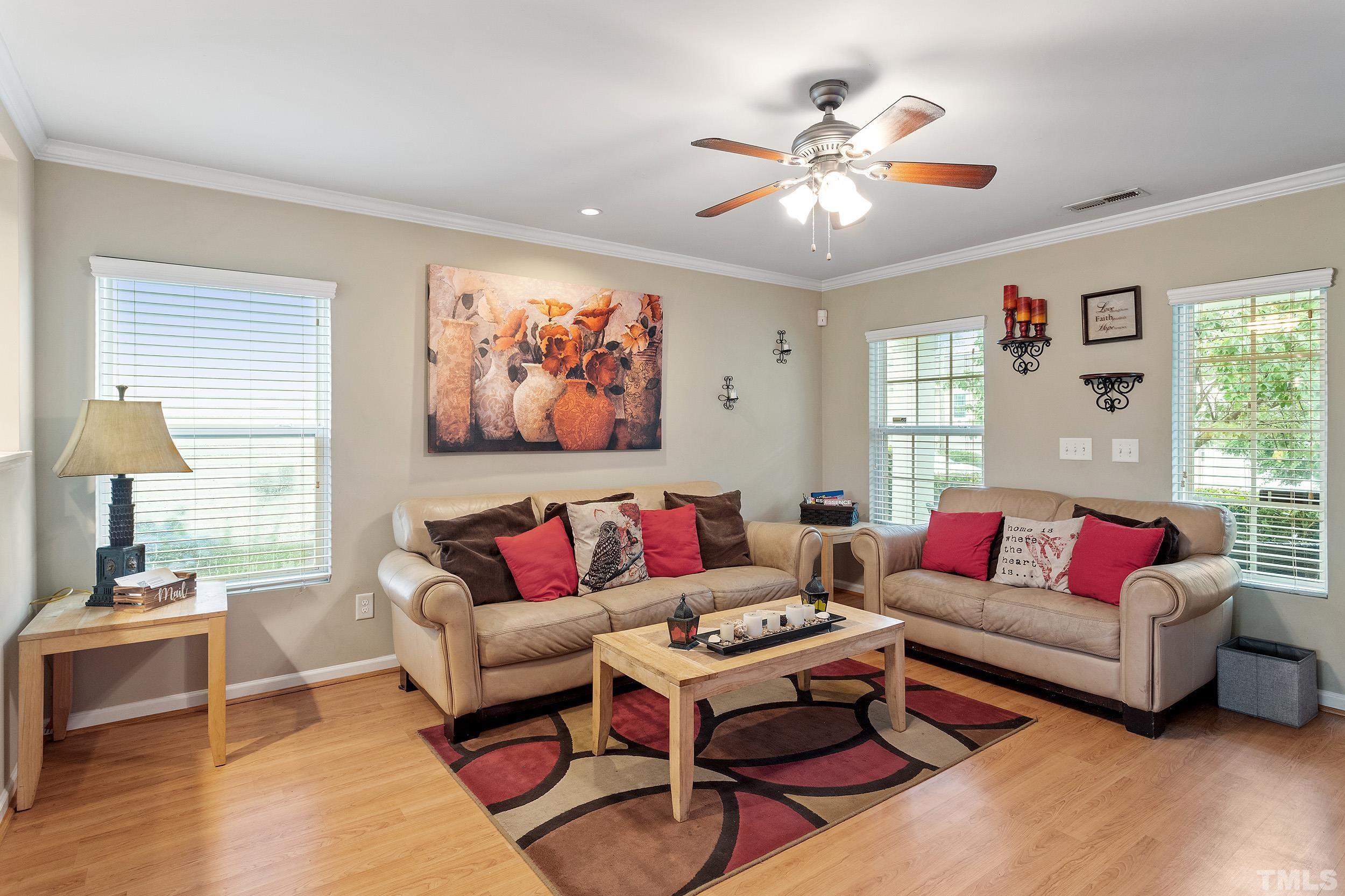 2500 Quarry Ridge Lane Raleigh, NC 27610 - Photo 4 of 29 a living room with furniture a rug and a window