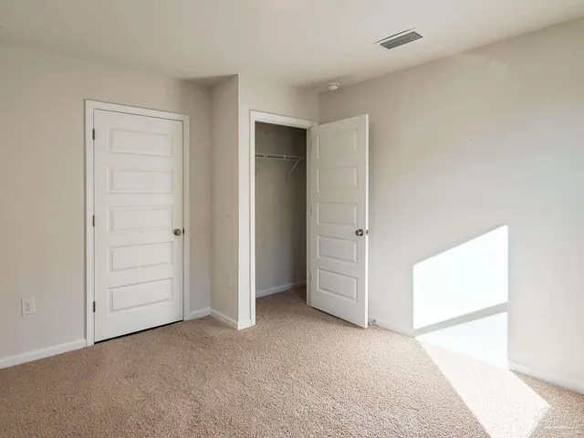 an empty room with closet