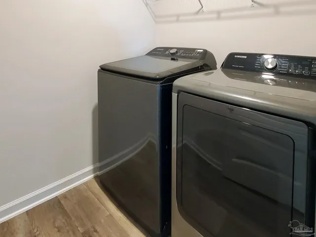a utility room with dryer and washer