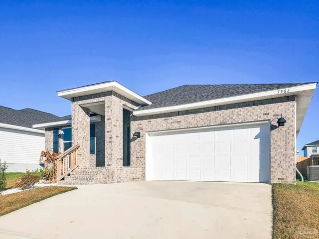 a view of a house with a outdoor space