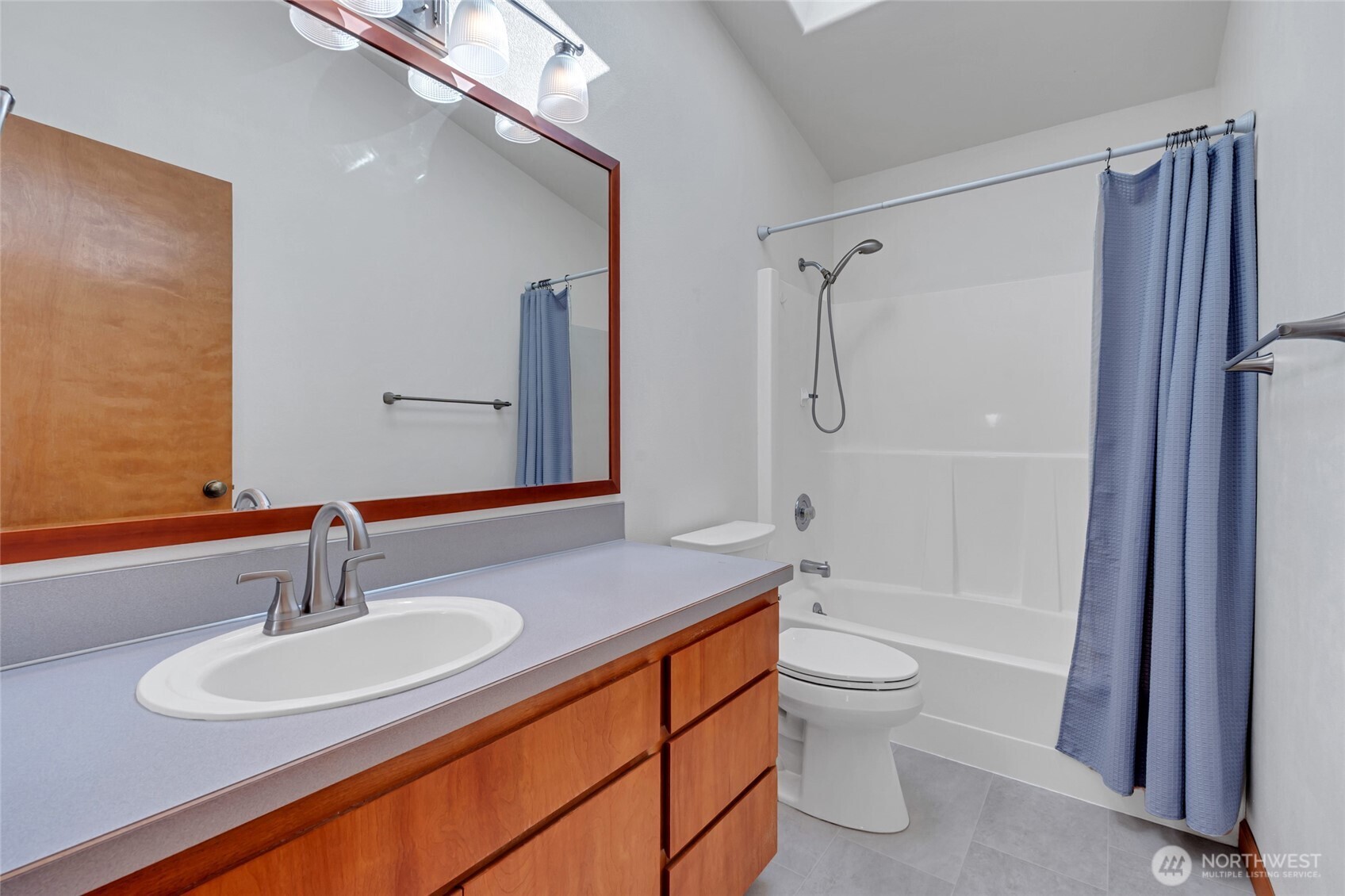 161 Duke Drive Sequim, WA 98382 - Photo 16 of 40 a bathroom with a sink a toilet and shower