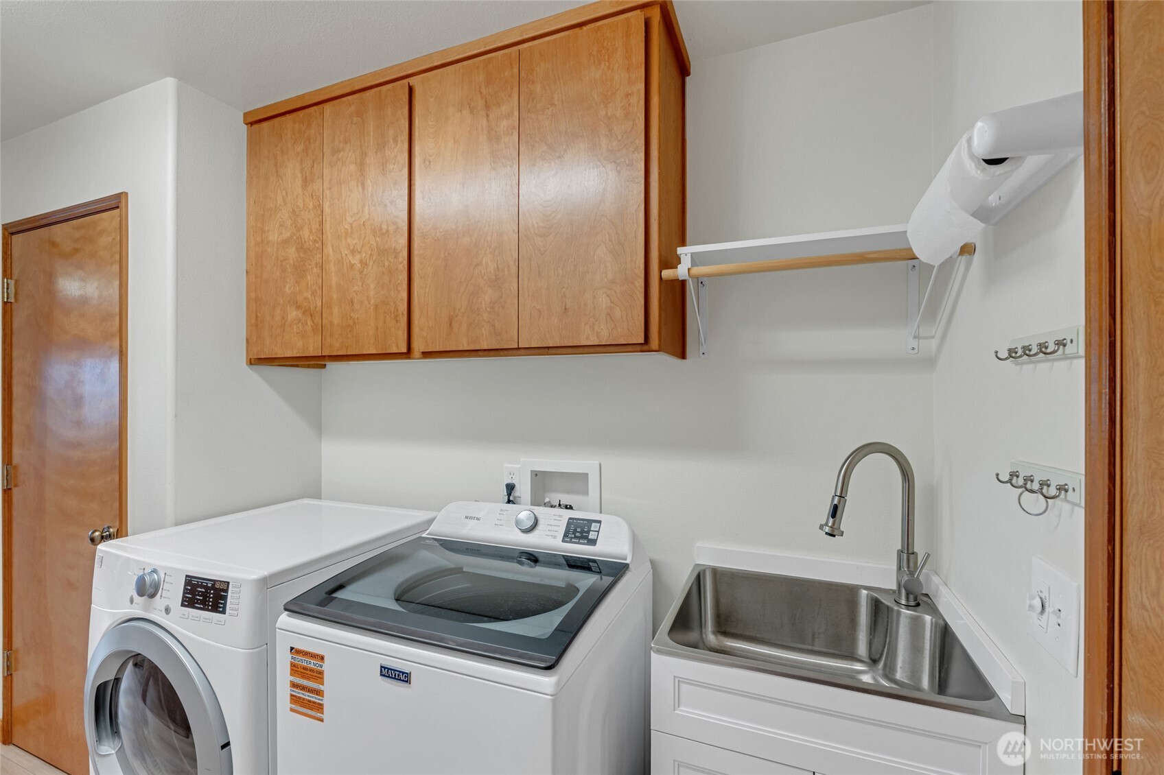 161 Duke Drive Sequim, WA 98382 - Photo 21 of 40 a bathroom with a sink and washing machine
