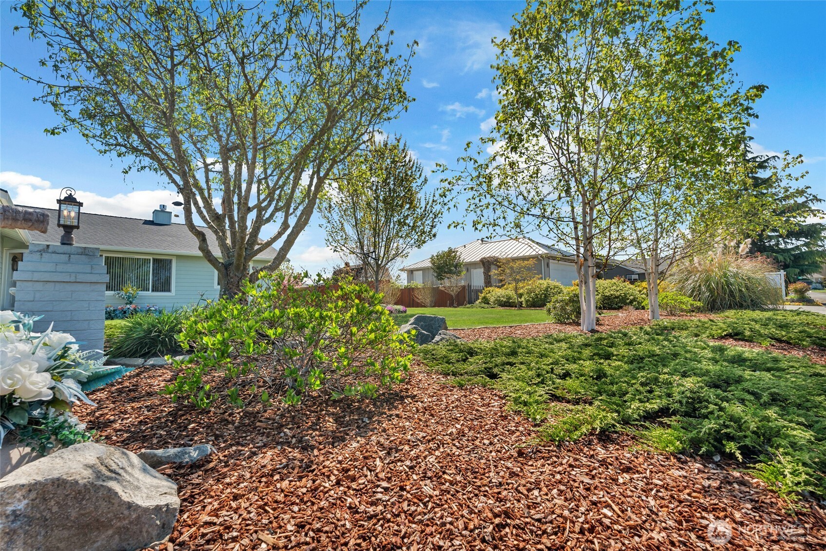 161 Duke Drive Sequim, WA 98382 - Photo 37 of 40 a view of a house with a yard and large trees
