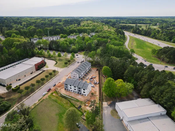 an aerial view of a house with a garden