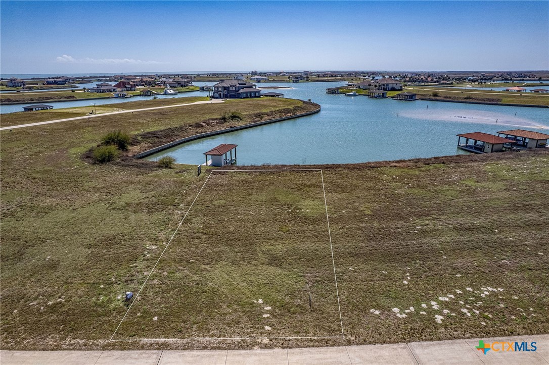 Lot 296 East Lago Loop Rd Port Port O'Connor, TX 77982 - Photo 2 of 13 a view of an ocean and city