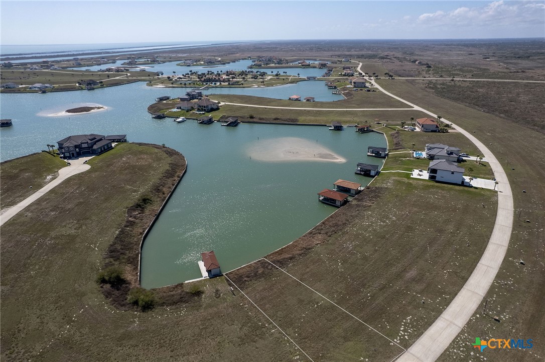 Lot 296 East Lago Loop Rd Port Port O'Connor, TX 77982 - Photo 4 of 13 an aerial view of a city