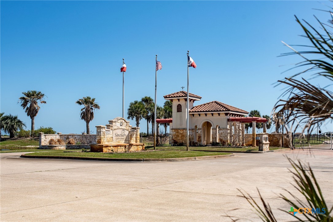 Lot 296 East Lago Loop Rd Port Port O'Connor, TX 77982 - Photo 10 of 13 a front view of a building with street view