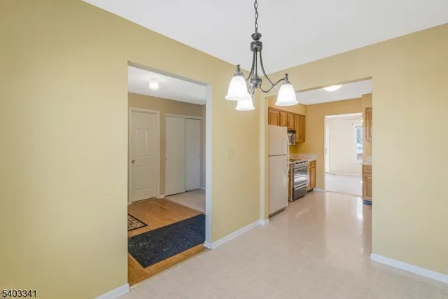 a view of a room with a chandelier