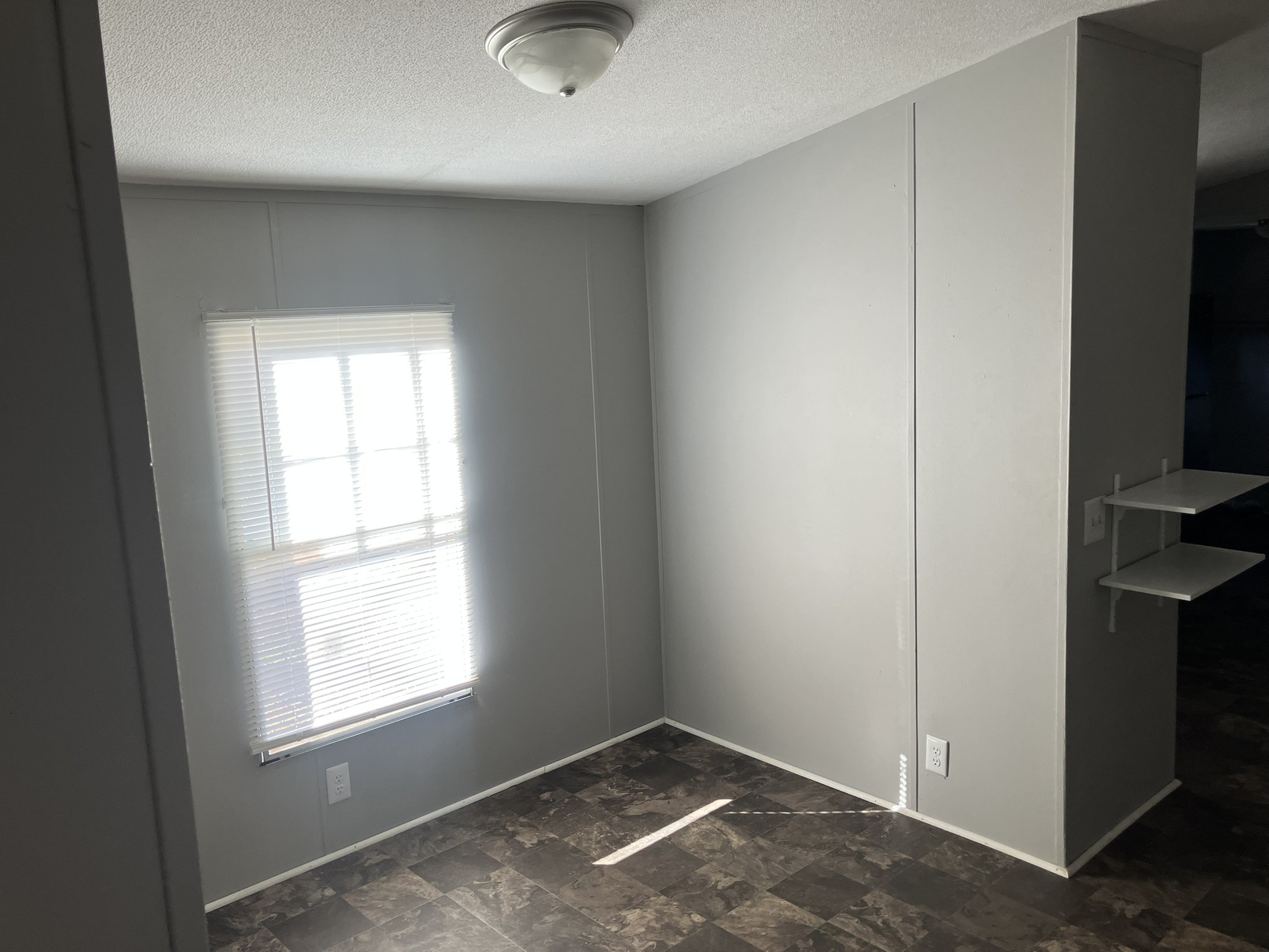 2412 Whitfield Road Clarksville, TN 37040 - Photo 13 of 18 an empty room with windows
