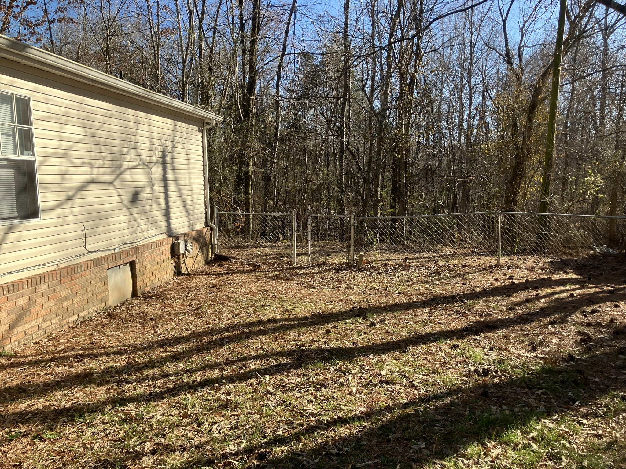 2412 Whitfield Road Clarksville, TN 37040 - Photo 18 of 18 a backyard of a house with lots of green space