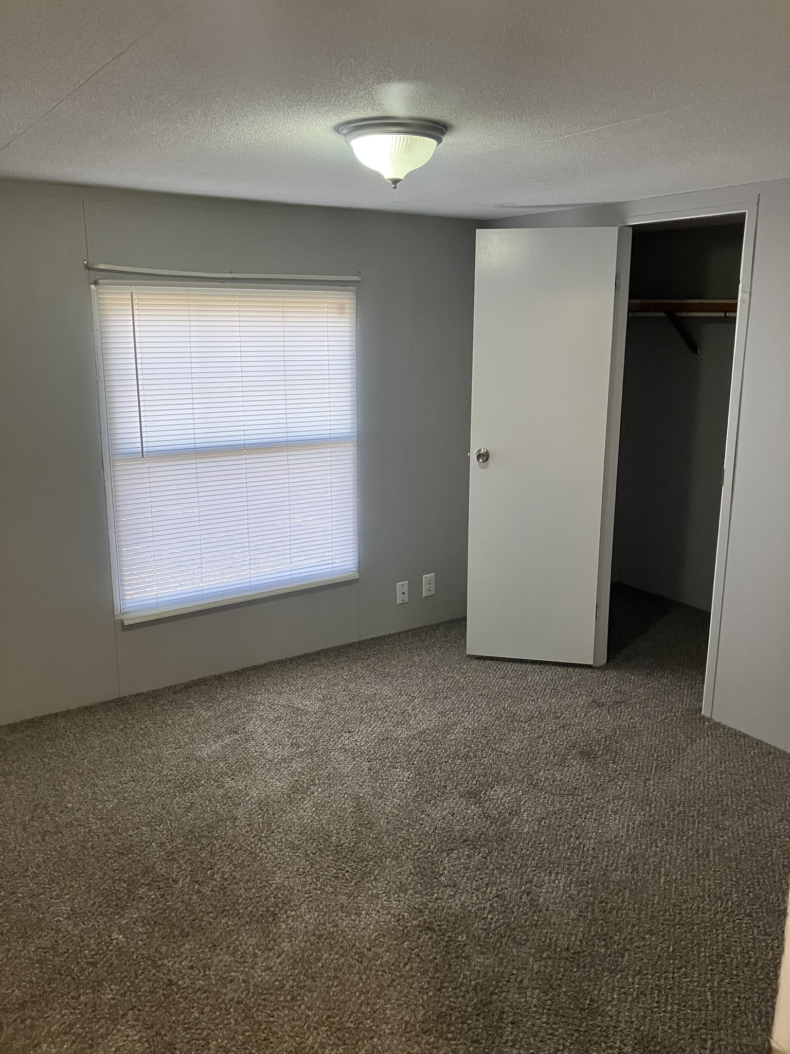 2412 Whitfield Road Clarksville, TN 37040 - Photo 3 of 18 an empty room with a window