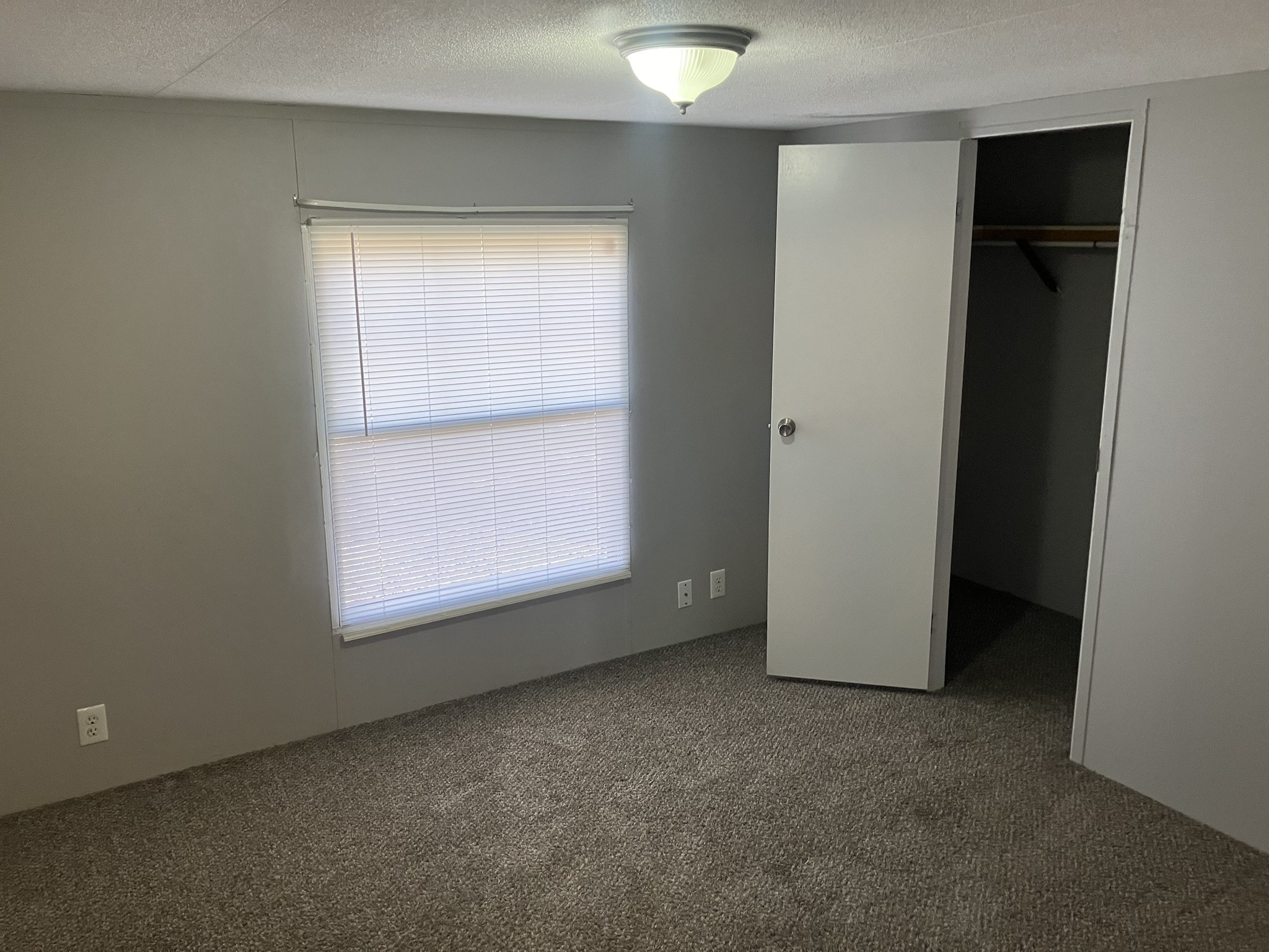 2412 Whitfield Road Clarksville, TN 37040 - Photo 4 of 18 an empty room with a window