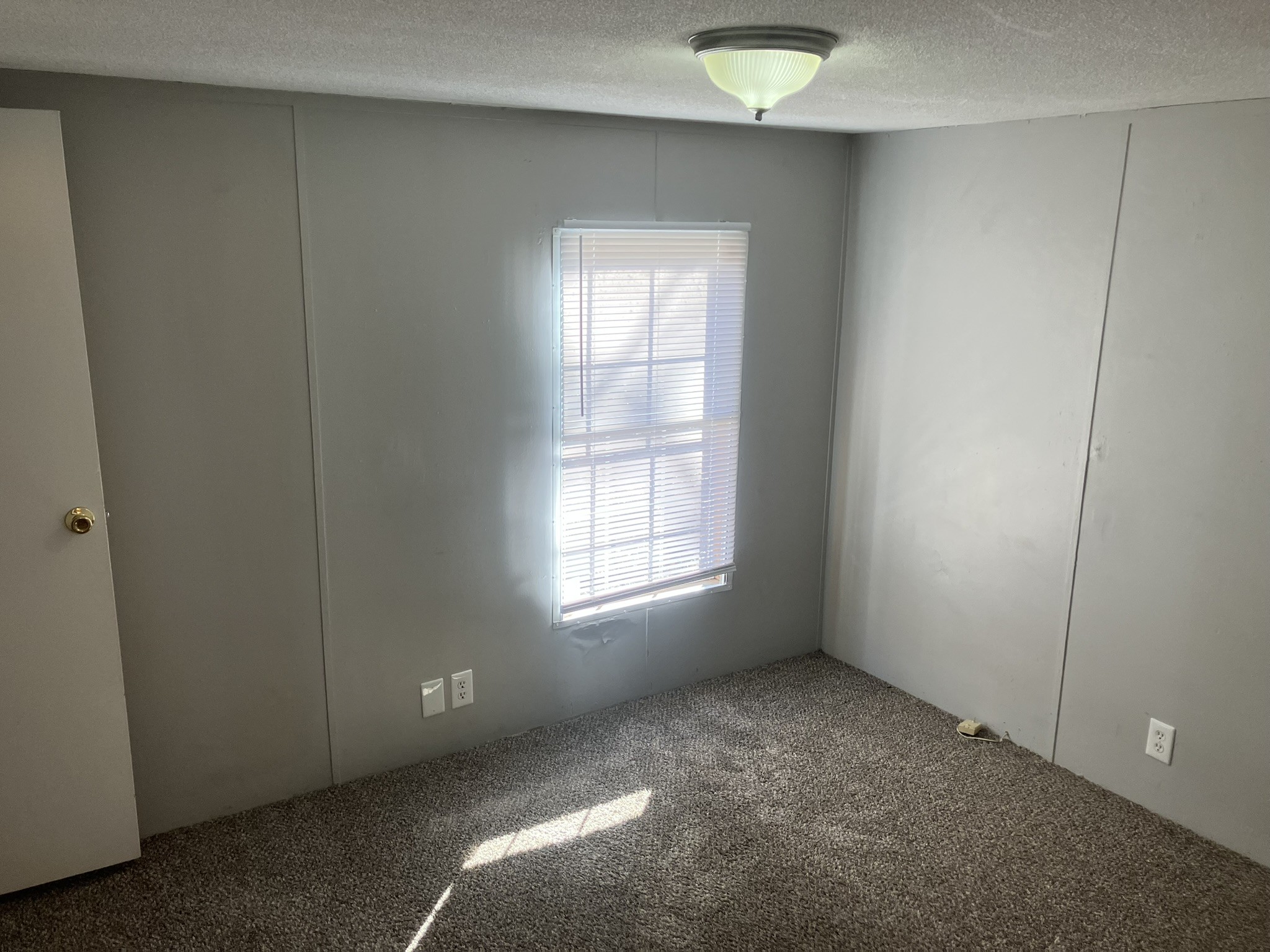 2412 Whitfield Road Clarksville, TN 37040 - Photo 5 of 18 a view of an empty room with window