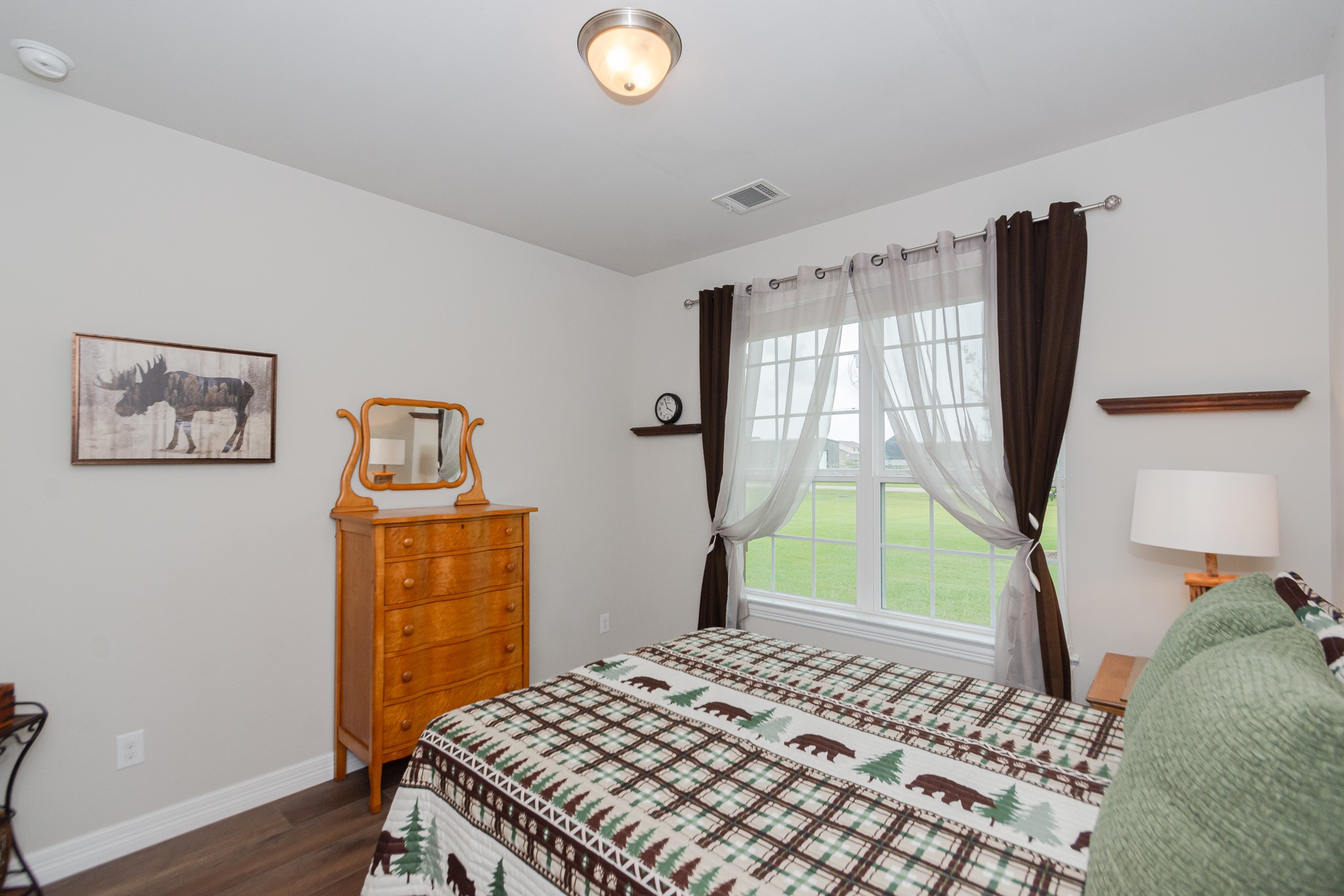 7818 Pebble Hill Lane Rosharon, TX 77583 - Photo 37 of 47 a bedroom with a bed and a window