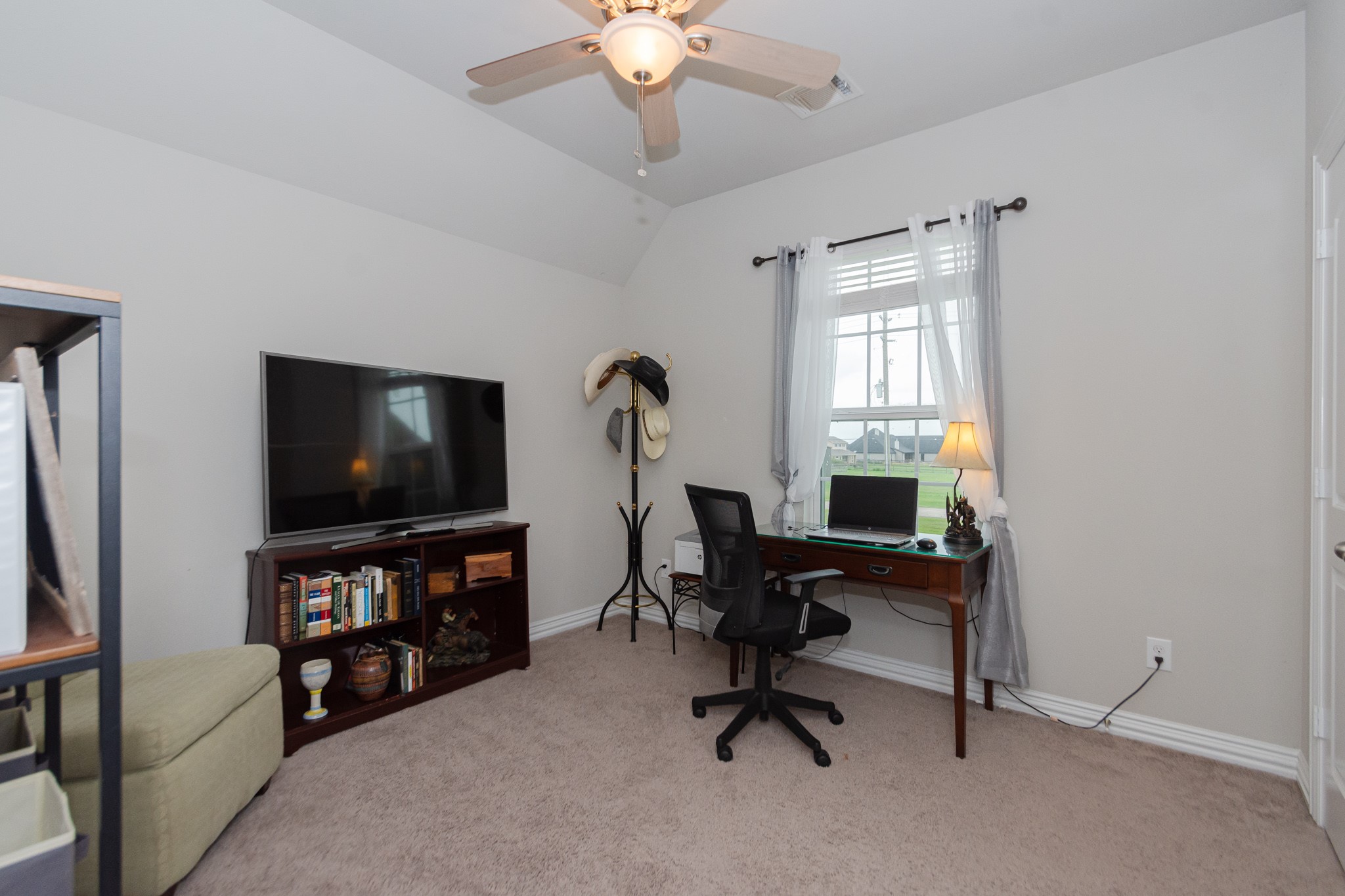 7818 Pebble Hill Lane Rosharon, TX 77583 - Photo 42 of 47 a view of a livingroom with workspace and a window