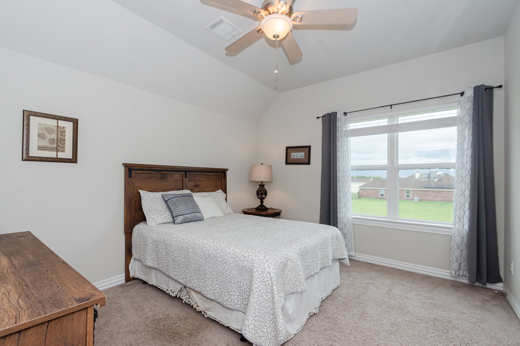 7818 Pebble Hill Lane Rosharon, TX 77583 - Photo 44 of 47 a bedroom with a large bed and a window