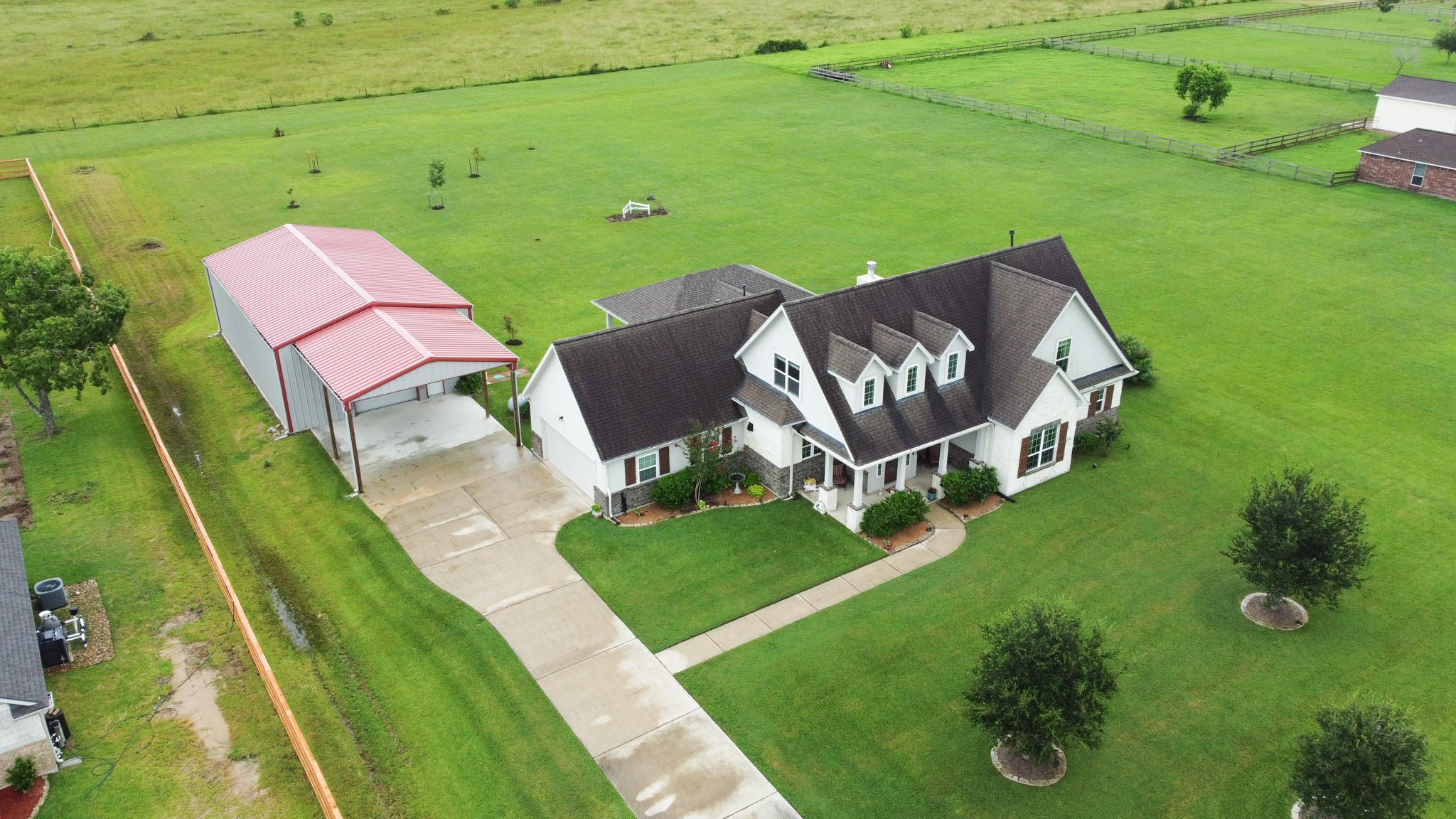 7818 Pebble Hill Lane Rosharon, TX 77583 - Photo 7 of 47 a view of a two chairs in the park