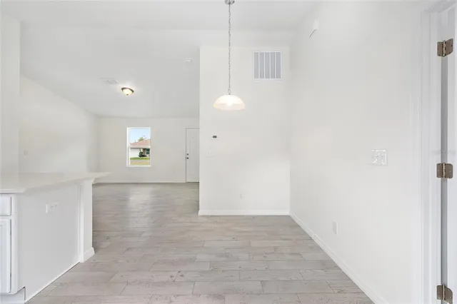 a view of a kitchen with a sink