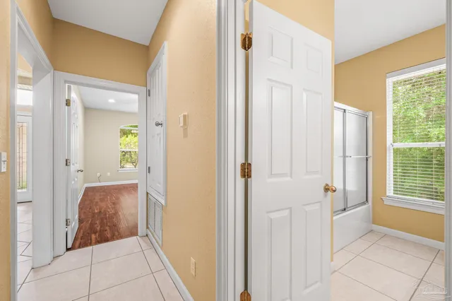 a bathroom with a bathtub and shower