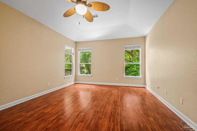 a bathroom with a shower and a sink