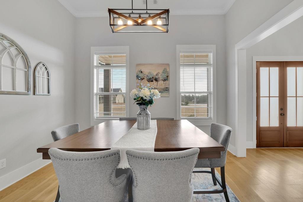 29 Ravenfield Road Taylorsville, GA 30178 - Photo 12 of 80 a view of a dining room with furniture and wooden floor