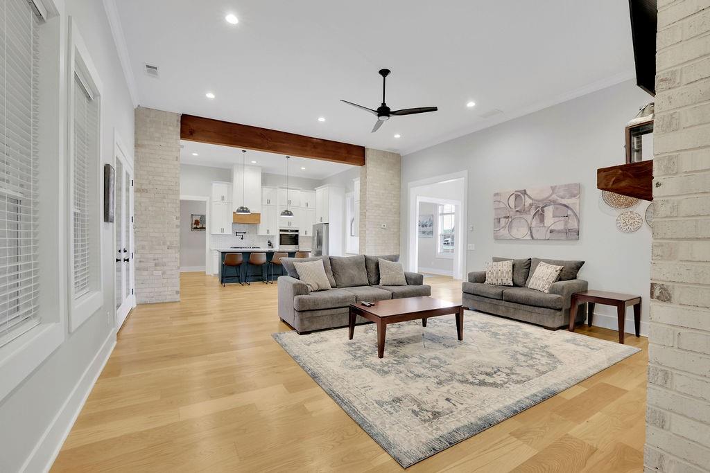 29 Ravenfield Road Taylorsville, GA 30178 - Photo 15 of 80 a living room with furniture and a chandelier
