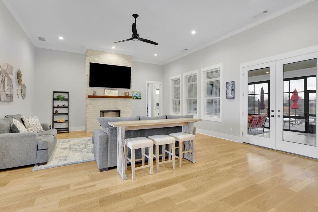 29 Ravenfield Road Taylorsville, GA 30178 - Photo 18 of 80 a living room with furniture a flat screen tv and kitchen view