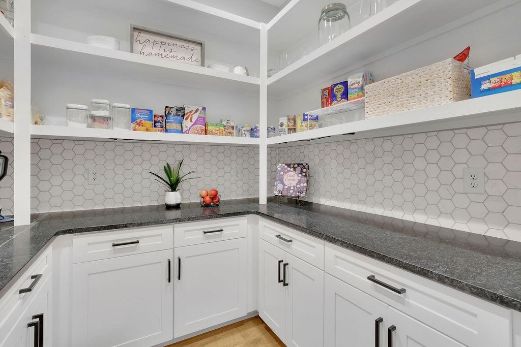 29 Ravenfield Road Taylorsville, GA 30178 - Photo 26 of 80 a kitchen with cabinets and white appliances