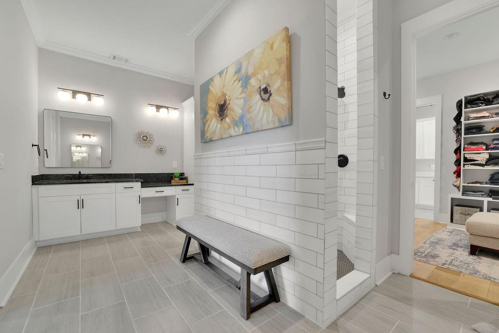 29 Ravenfield Road Taylorsville, GA 30178 - Photo 31 of 80 a bathroom with a sink a toilet and shower