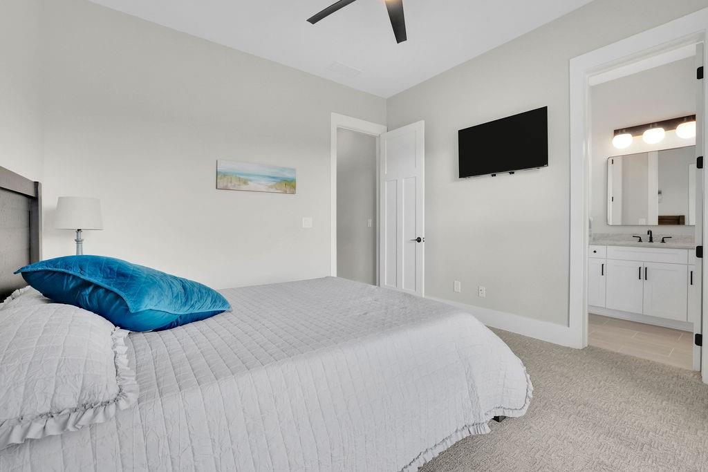 29 Ravenfield Road Taylorsville, GA 30178 - Photo 44 of 80 a bedroom with a bed and a flat screen tv