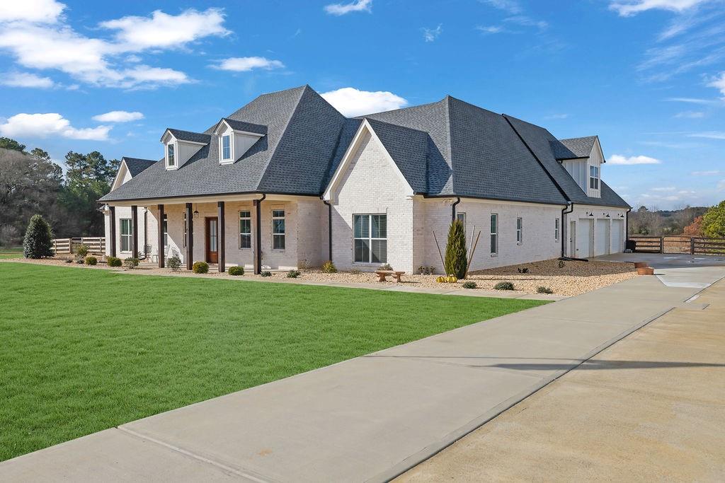 29 Ravenfield Road Taylorsville, GA 30178 - Photo 5 of 80 a view of a house with a yard