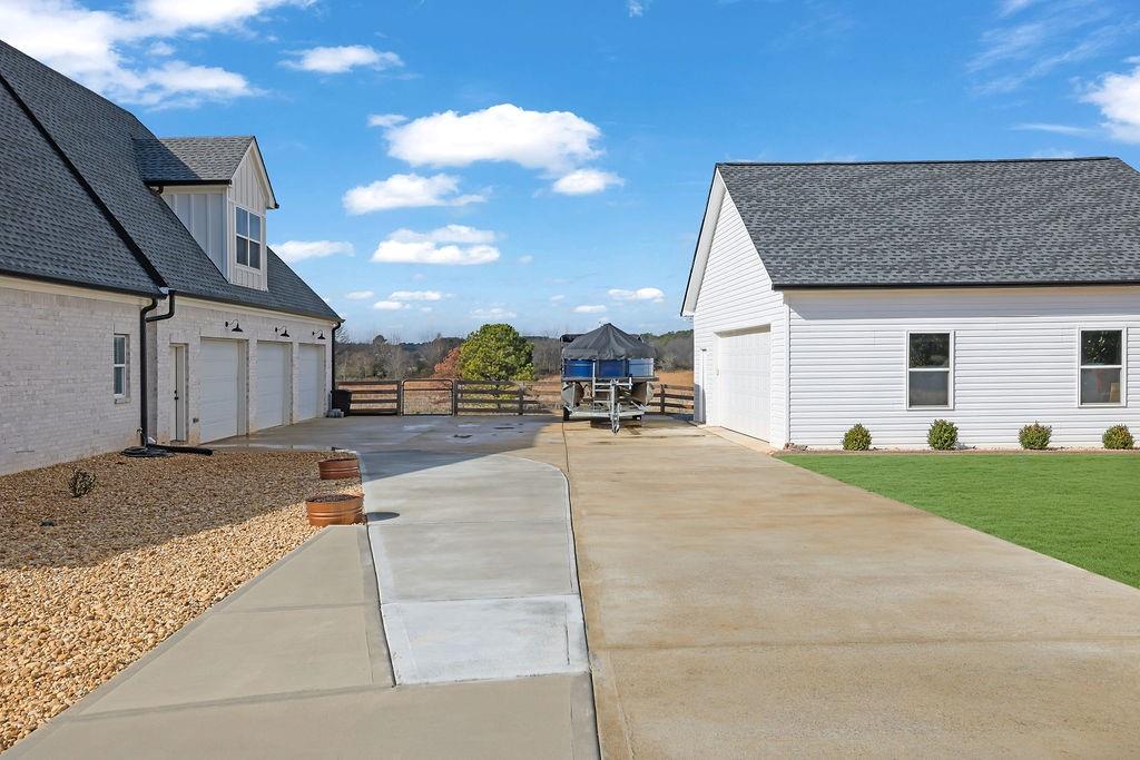 29 Ravenfield Road Taylorsville, GA 30178 - Photo 58 of 80 a view of a house with a patio