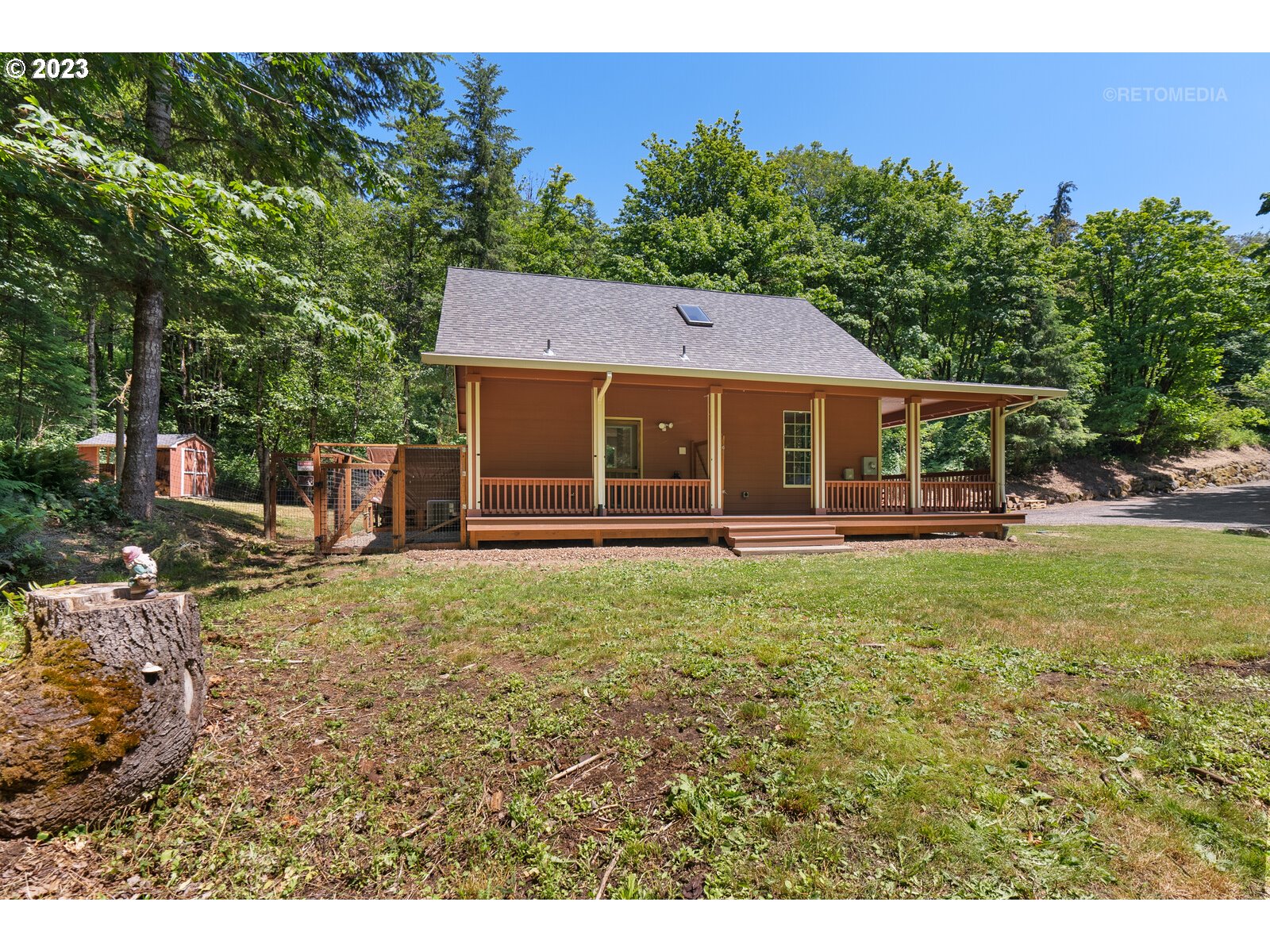 53550 Northwest Strassel Road Forest Grove, OR 97116 - Photo 23 of 44 a view of a house with a backyard