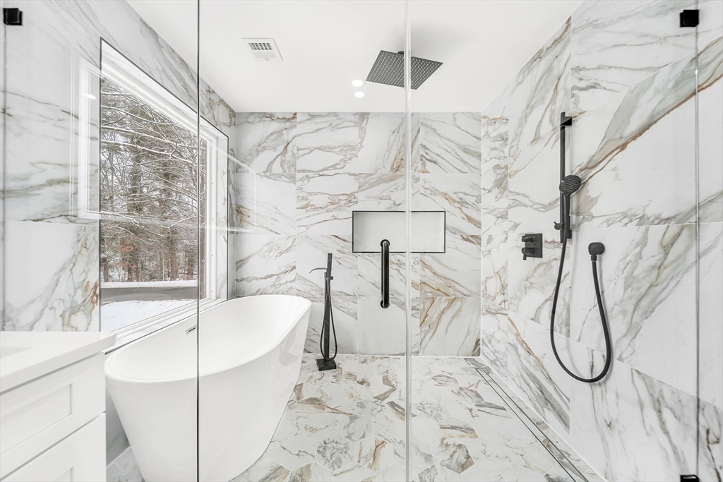 1 Sunnyside Avenue Wellesley, MA 02482 - Photo 15 of 30 a bathroom with a sink and a shower