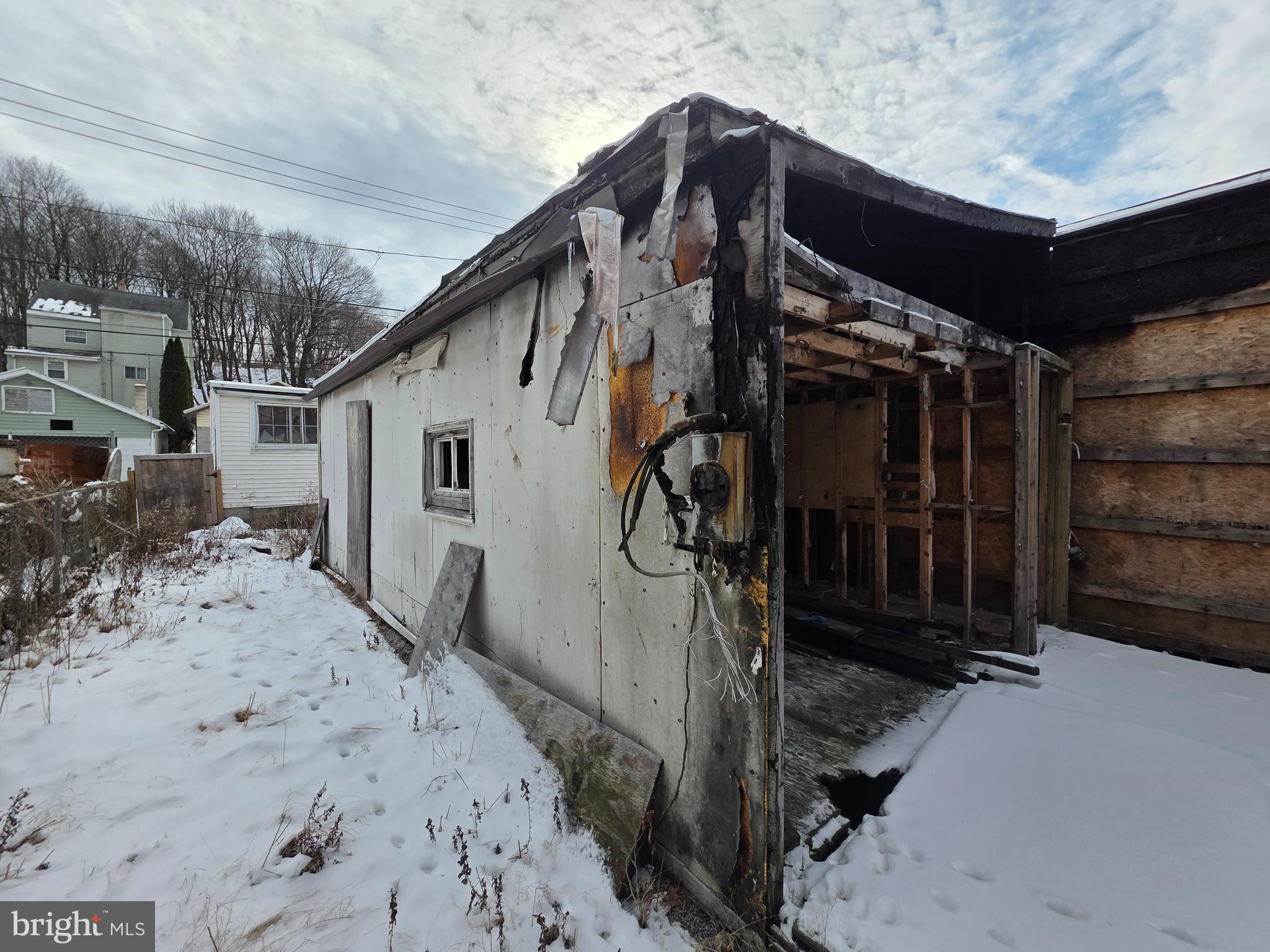 426 Centre Street Ashland, PA 17921 - Photo 11 of 30 a view of a house with wooden walls