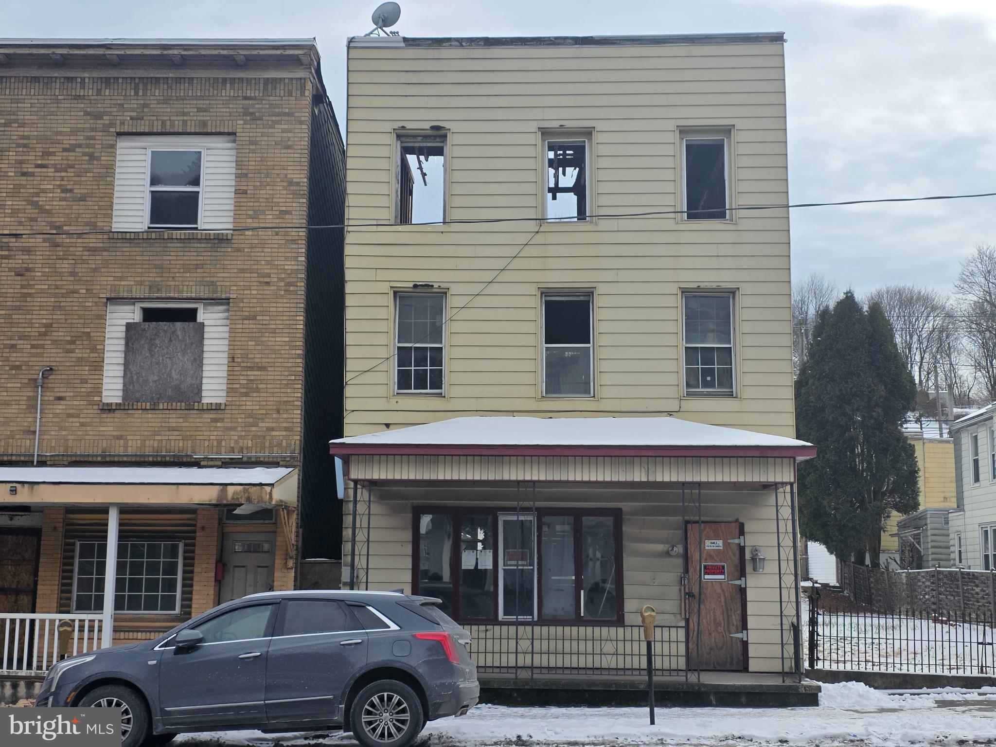 426 Centre Street Ashland, PA 17921 - Photo 3 of 30 a view of a car parked in front of a building