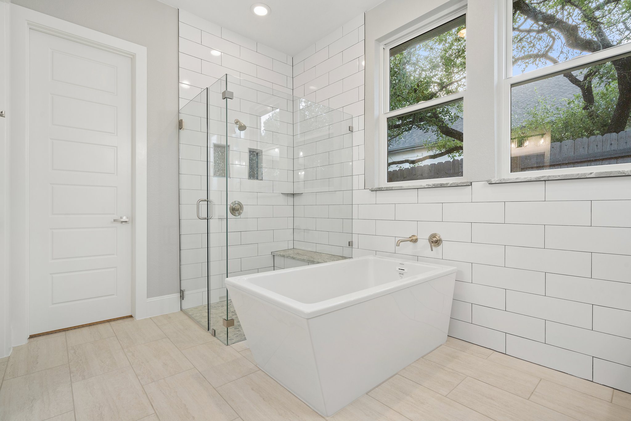 112 Axis Loop Georgetown, TX 78628 - Photo 23 of 39 a bathroom with a bathtub and shower