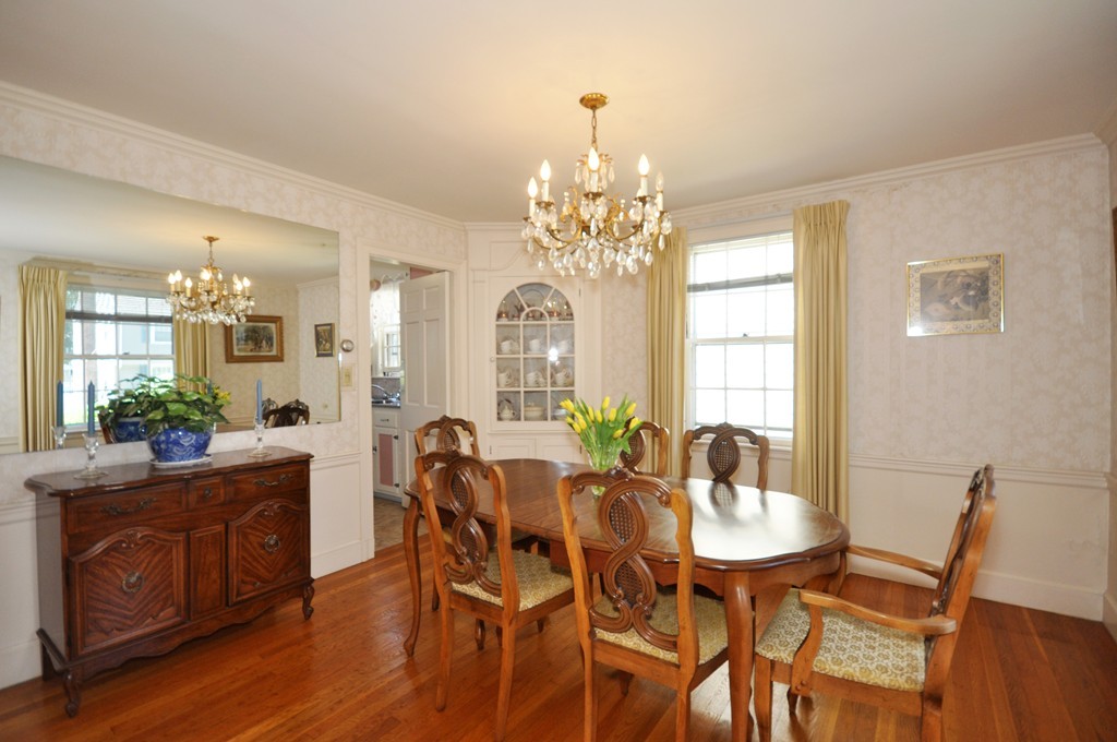 22 Bates Road Arlington, MA 02474 - Photo 12 of 30 a view of a dining room with furniture and wooden floor
