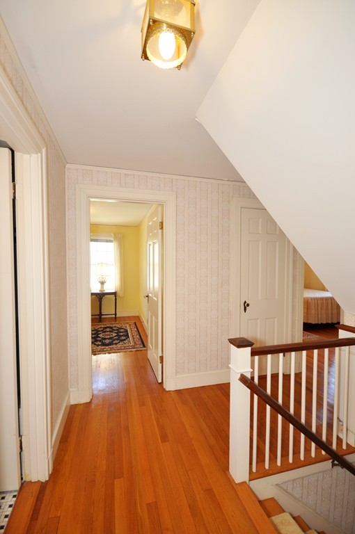 22 Bates Road Arlington, MA 02474 - Photo 17 of 30 a view of a livingroom with wooden floor and a window
