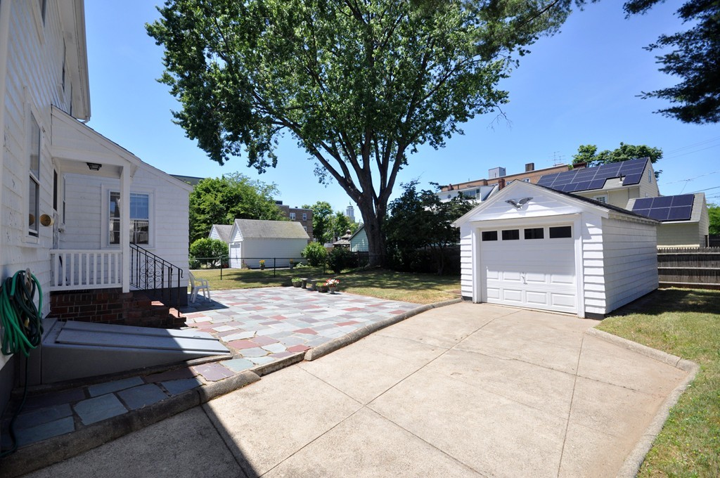 22 Bates Road Arlington, MA 02474 - Photo 29 of 30 a view of a house with a yard