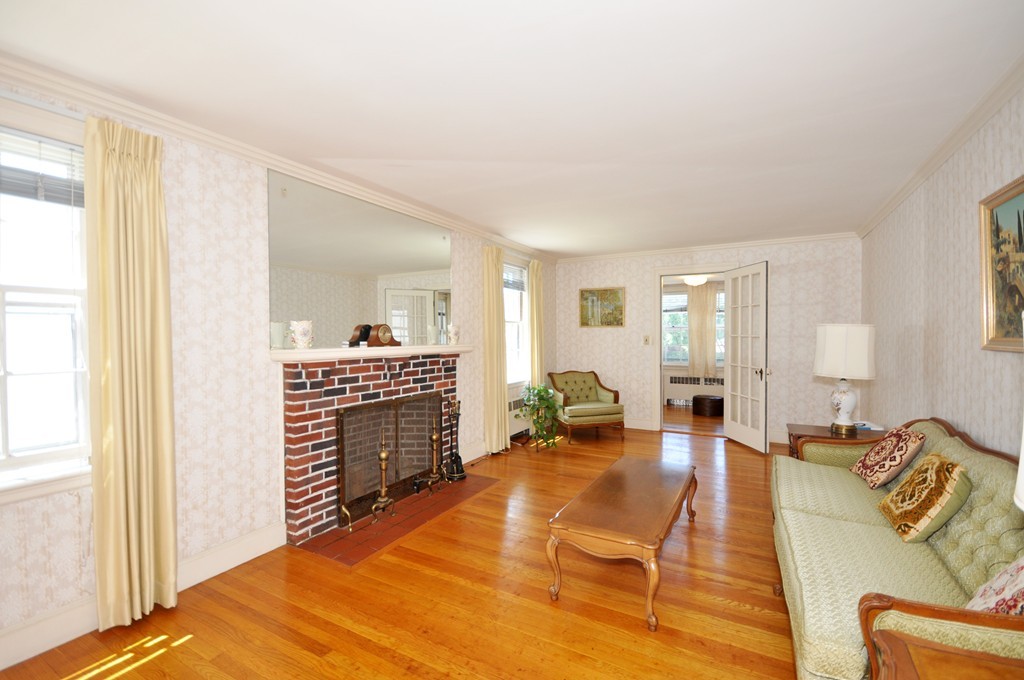 22 Bates Road Arlington, MA 02474 - Photo 7 of 30 a spacious bedroom with a bed and furniture