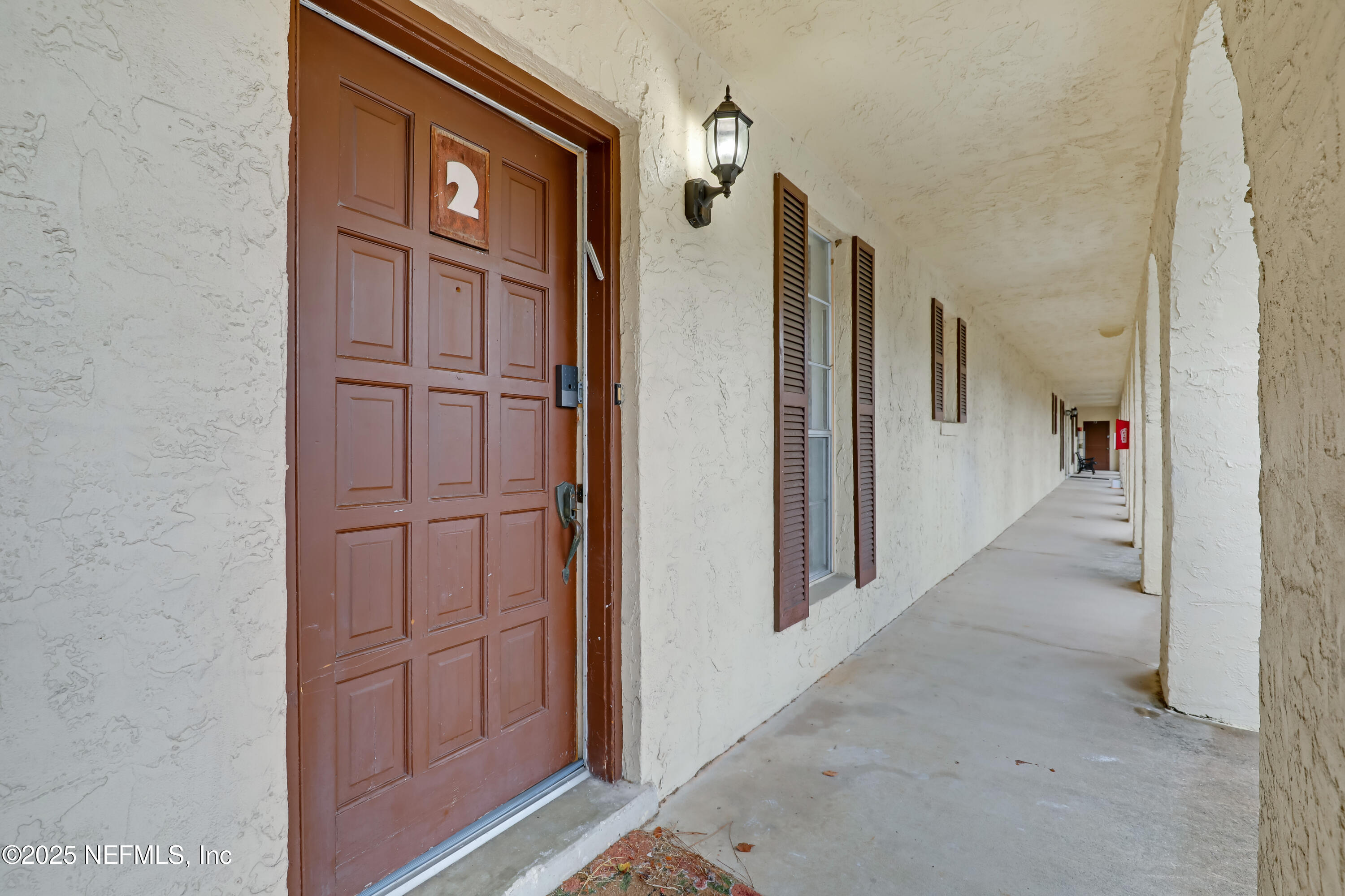 1618 El Camino Road, Unit 2 Jacksonville, FL 32216 - Photo 10 of 35 a view of a hallway with closet area