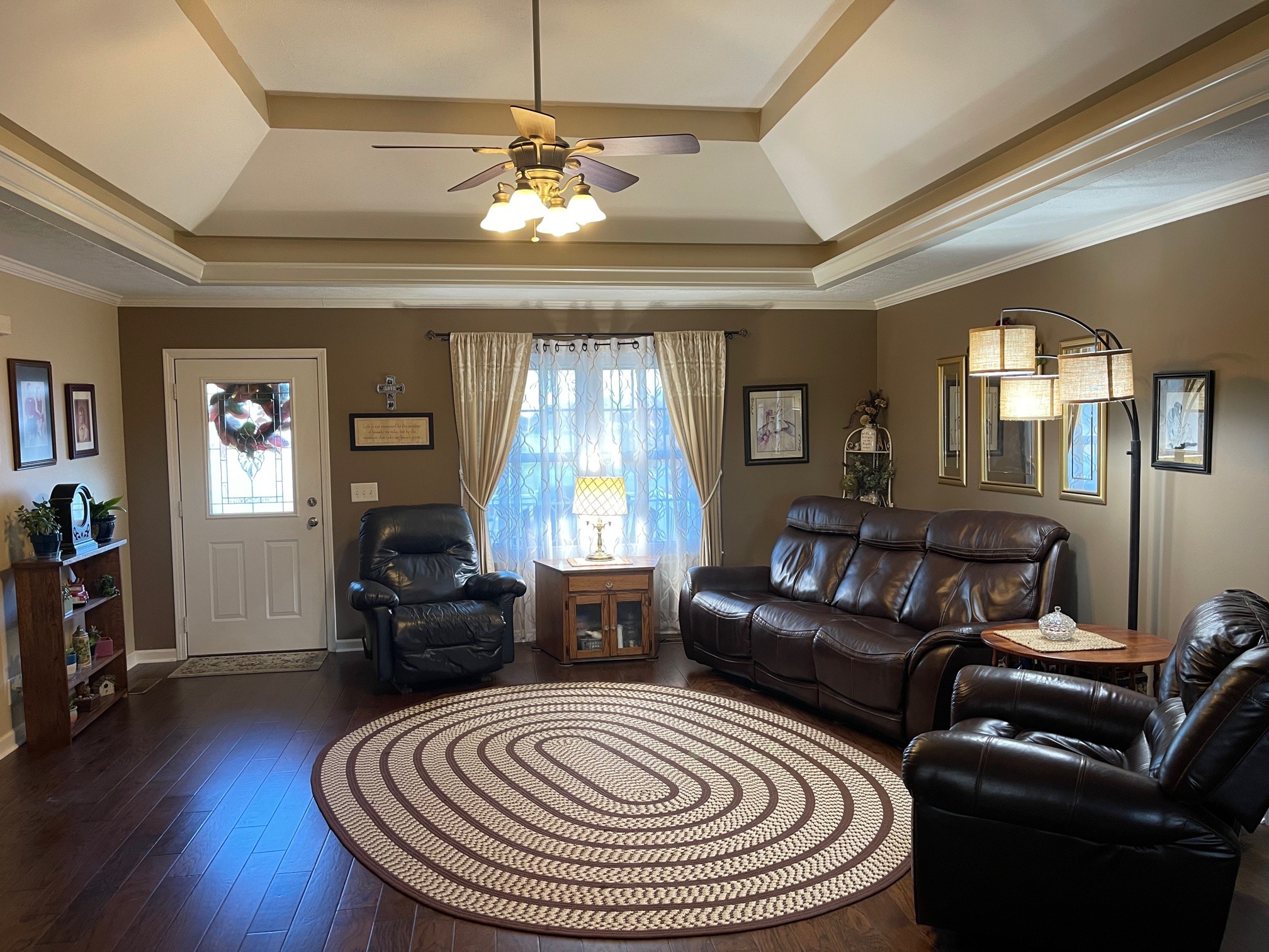 488 Cook Road Portland, TN 37148 - Photo 16 of 24 a living room with furniture and a chandelier