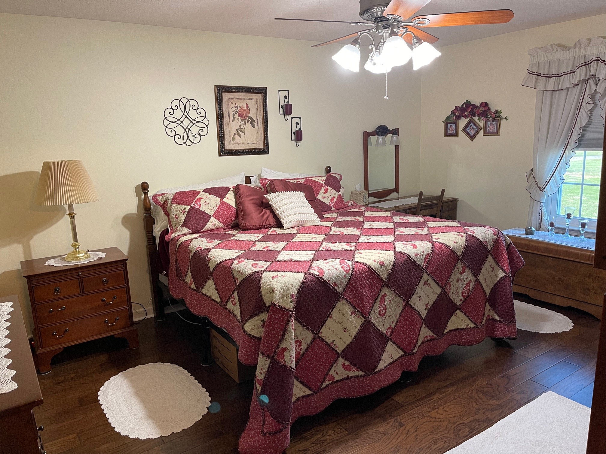 488 Cook Road Portland, TN 37148 - Photo 17 of 24 a bedroom with a bed and a lamp on dresser