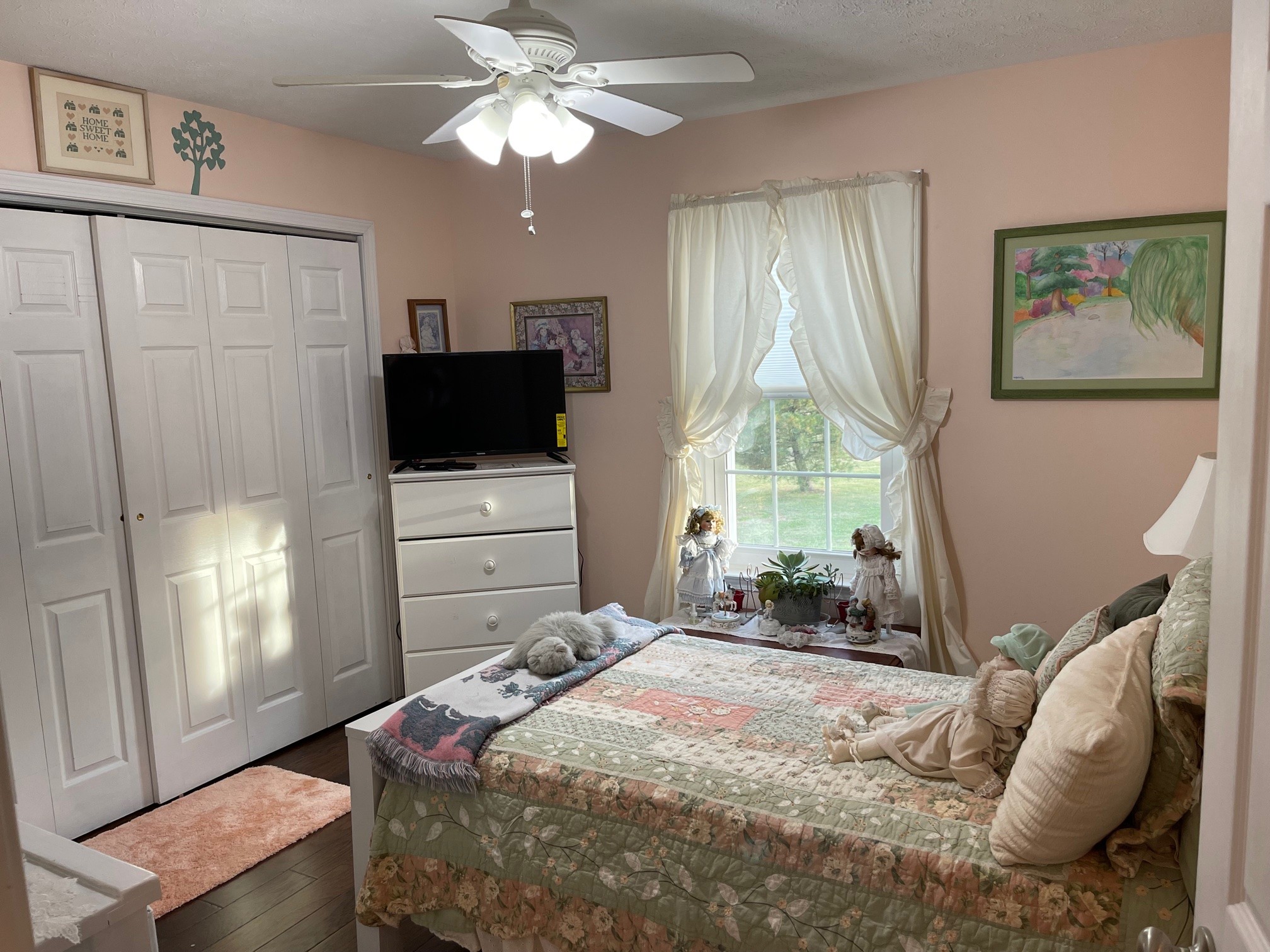 488 Cook Road Portland, TN 37148 - Photo 21 of 24 a bedroom with a bed and a flat tv screen on the dresser