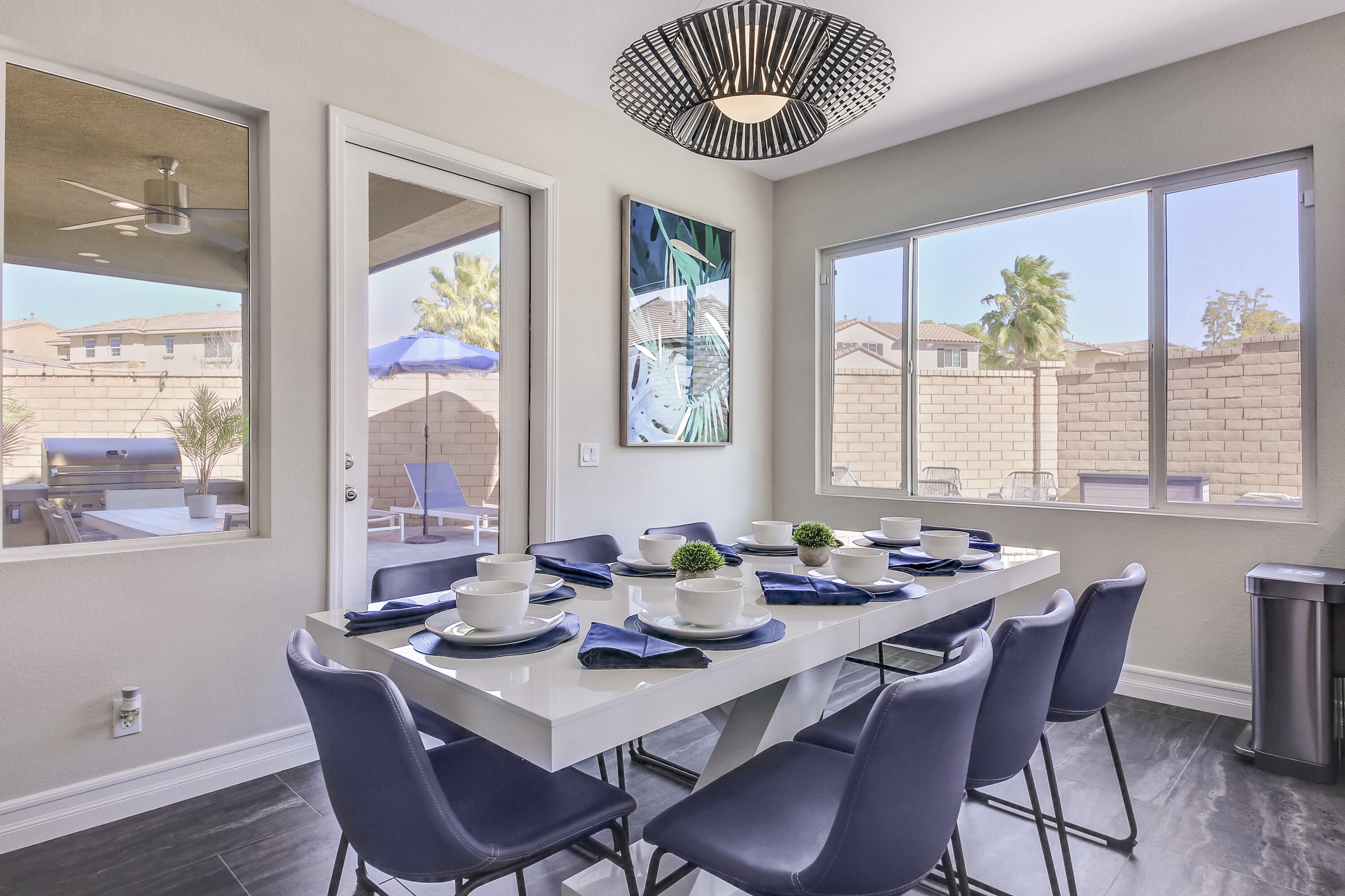 42942 Del Lago Court Indio, CA 92203 - Photo 11 of 75 a view of a dining room with furniture window and wooden floor
