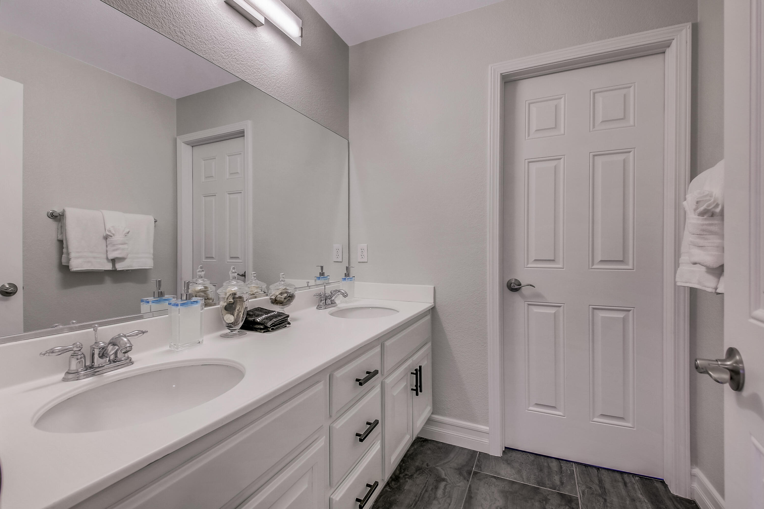 42942 Del Lago Court Indio, CA 92203 - Photo 18 of 75 a bathroom with double vanity sink and a mirror