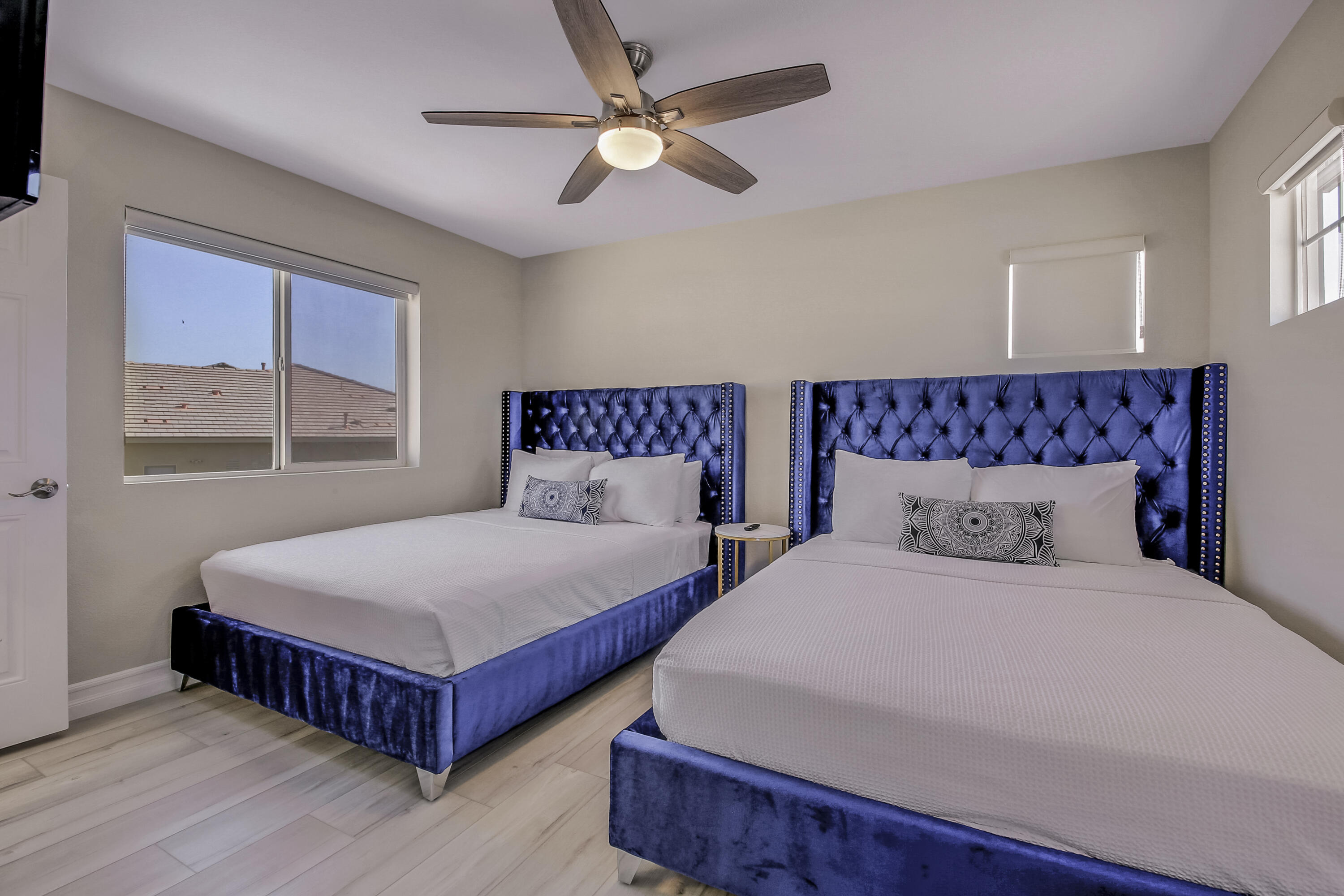 42942 Del Lago Court Indio, CA 92203 - Photo 19 of 75 a bedroom with two beds and windows